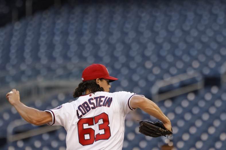 Jun 30, 2021; Washington, District of Columbia, USA; Washington Nationals relief pitcher Kyle Lobstein (63) pitches against the Tampa Bay Rays in the ninth inning at Nationals Park. Mandatory Credit: Geoff Burke-USA TODAY Sports