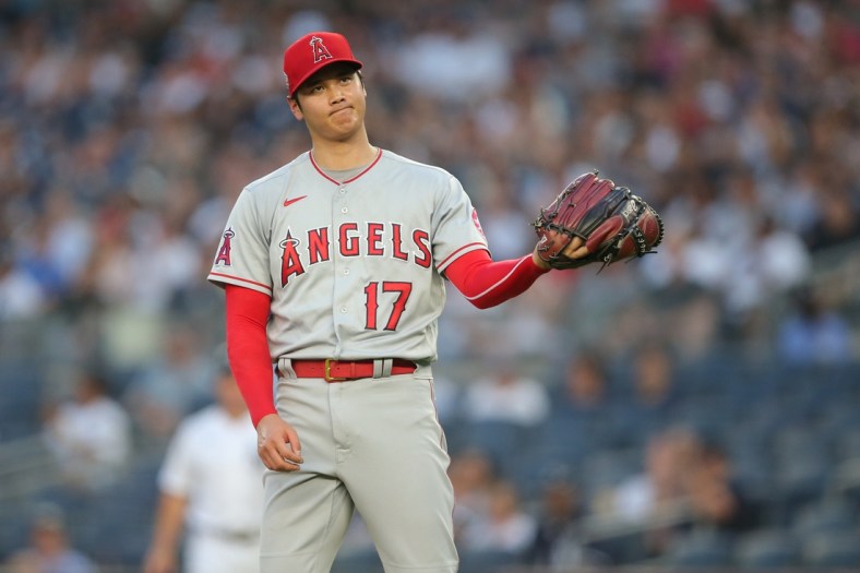 Jun 30, 2021; Bronx, New York, USA; Los Angeles Angels starting pitcher Shohei Ohtani (17) reacts during the first inning against the New York Yankees at Yankee Stadium. Mandatory Credit: Brad Penner-USA TODAY Sports
