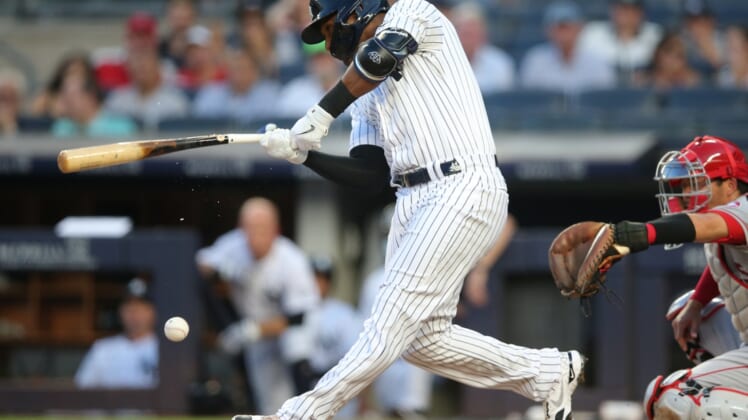 Jun 30, 2021; Bronx, New York, USA; New York Yankees left fielder Miguel Andujar (41) breaks his bat as he hits into an RBI fielder's choice during the first inning against the Los Angeles Angels at Yankee Stadium. Mandatory Credit: Brad Penner-USA TODAY Sports