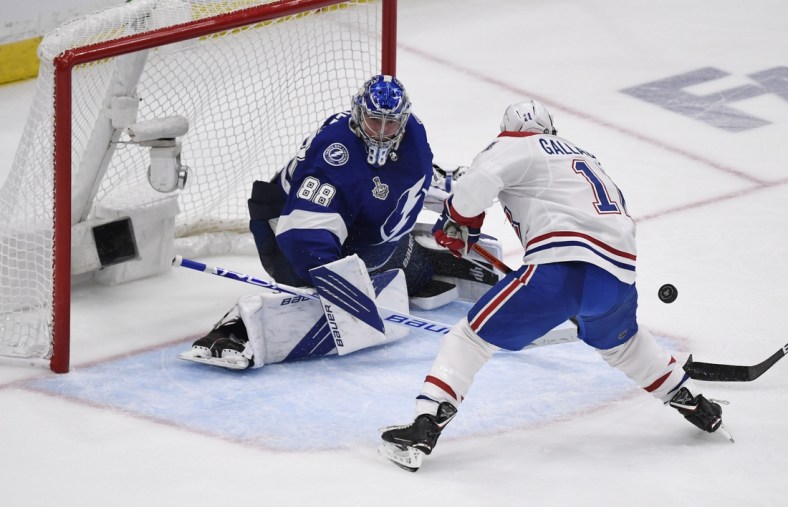 Jun 30, 2021; Tampa, Florida, USA; Tampa Bay Lightning goaltender Andrei Vasilevskiy (88) makes a save against Montreal Canadiens right wing Brendan Gallagher (11) during the third period in game two of the 2021 Stanley Cup Final at Amalie Arena. Mandatory Credit: Douglas DeFelice-USA TODAY Sports