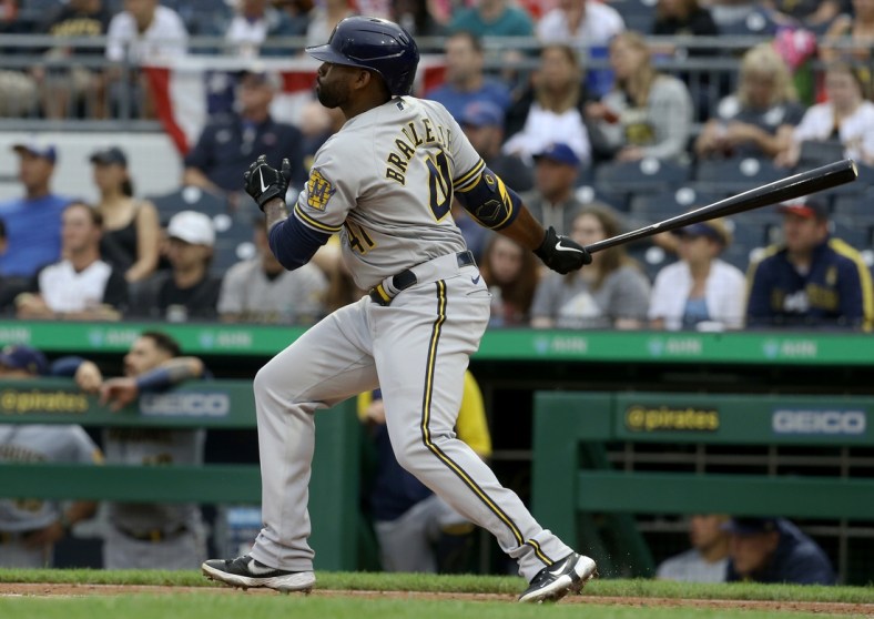 Jul 1, 2021; Pittsburgh, Pennsylvania, USA; Milwaukee Brewers center fielder Jackie Bradley Jr. (41) hits an RBI double against the Pittsburgh Pirates during the second inning at PNC Park. Mandatory Credit: Charles LeClaire-USA TODAY Sports