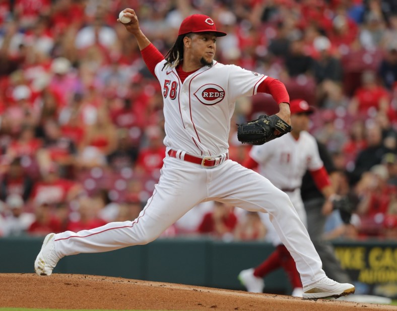 Jul 1, 2021; Cincinnati, Ohio, USA; Cincinnati Reds starting pitcher Luis Castillo (58) throws a pitch against the San Diego Padres during the first inning at Great American Ball Park. Mandatory Credit: David Kohl-USA TODAY Sports