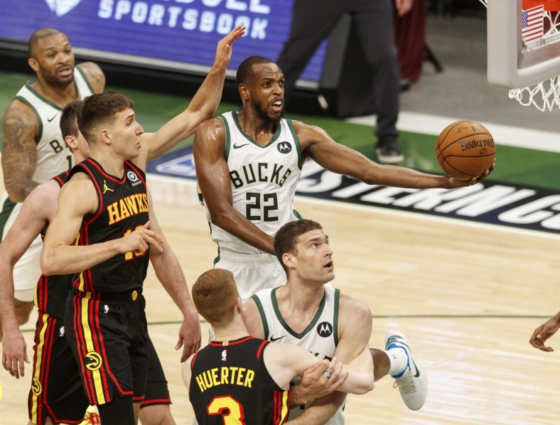 Jul 1, 2021; Milwaukee, Wisconsin, USA;  Milwaukee Bucks forward Khris Middleton (22) shoots during the second quarter against the Atlanta Hawks during game five of the Eastern Conference Finals for the 2021 NBA Playoffs at Fiserv Forum. Mandatory Credit: Jeff Hanisch-USA TODAY Sports