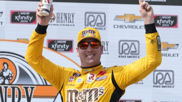 Jul 3, 2021; Elkhart Lake, WI, USA; Xfinity Series driver Kyle Busch (54) reacts after winning the Henry 180 at Road America. Mandatory Credit: Mike Dinovo-USA TODAY Sports