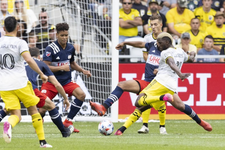 Jul 3, 2021; Columbus, Ohio, USA; Columbus Crew forward Gyasi Zardes (11) scores on this shot against New England Revolution in the first half at Lower.com Field. Mandatory Credit: Greg Bartram-USA TODAY Sports