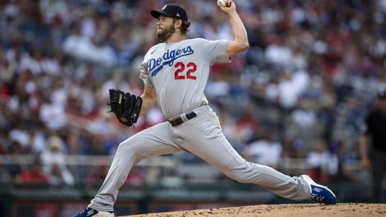 Jul 3, 2021; Washington, District of Columbia, USA; Los Angeles Dodgers starting pitcher Clayton Kershaw (22) throws a pitch against the Washington Nationals during the first inning at Nationals Park. Mandatory Credit: Scott Taetsch-USA TODAY Sports