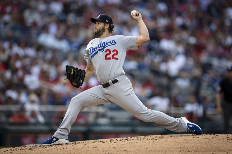 Jul 3, 2021; Washington, District of Columbia, USA; Los Angeles Dodgers starting pitcher Clayton Kershaw (22) throws a pitch against the Washington Nationals during the first inning at Nationals Park. Mandatory Credit: Scott Taetsch-USA TODAY Sports