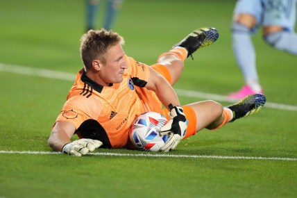 Jul 4, 2021; Carson, California, USA; Sporting KC goalkeeper Tim Melia (29) makes a save in the second half against the LA Galaxyt Dignity Health Sports Park. Mandatory Credit: Kirby Lee-USA TODAY Sports