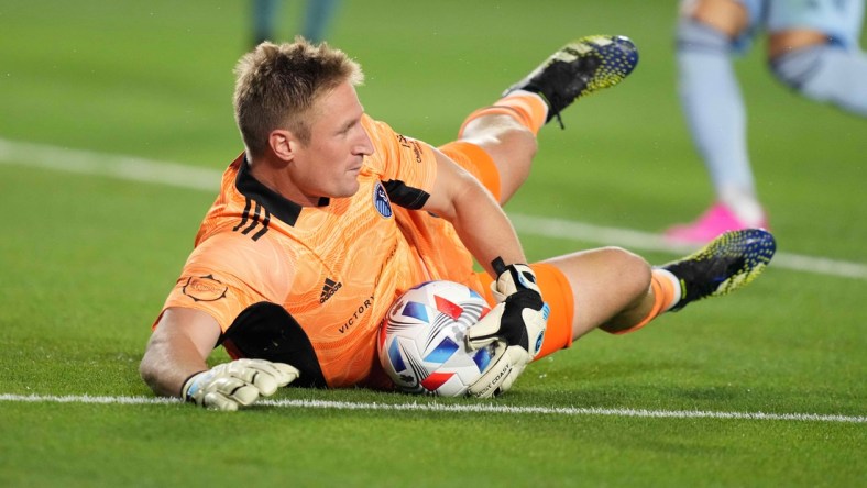 Jul 4, 2021; Carson, California, USA; Sporting KC goalkeeper Tim Melia (29) makes a save in the second half against the LA Galaxyt Dignity Health Sports Park. Mandatory Credit: Kirby Lee-USA TODAY Sports