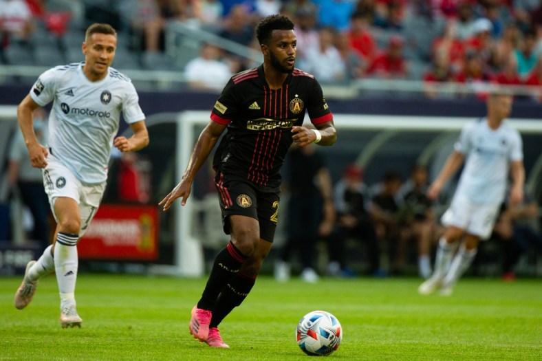 Jul 3, 2021; Chicago, Illinois, USA; Atlanta United midfielder Mo Adams (29) dribbles the ball against the Chicago Fire during the first half at Soldier Field. Mandatory Credit: Jon Durr-USA TODAY Sports