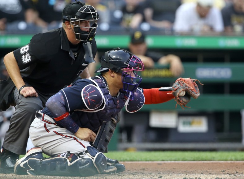 Jul 5, 2021; Pittsburgh, Pennsylvania, USA;  Atlanta Braves catcher William Contreras (24) receives a pitch against the Pittsburgh Pirates during the first inning at PNC Park. Mandatory Credit: Charles LeClaire-USA TODAY Sports