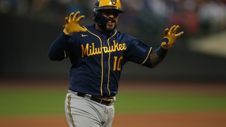 Jul 5, 2021; New York City, New York, USA; Milwaukee Brewers catcher Omar Narvaez (10) gestures as he rounds the bases after hitting a solo home run against the New York Mets during the fourth inning at Citi Field. Mandatory Credit: Brad Penner-USA TODAY Sports