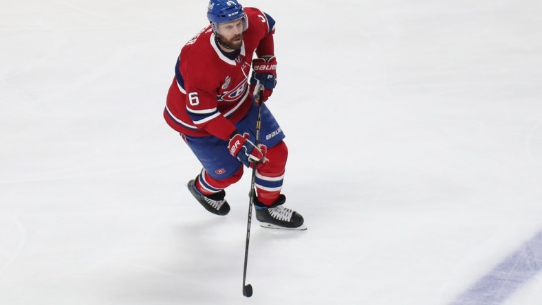 Jul 5, 2021; Montreal, Quebec, CAN; Montreal Canadiens defenseman Shea Weber (6) controls the puck against the Tampa Bay Lightning during the second period in game four of the 2021 Stanley Cup Final at Bell Centre. Mandatory Credit: Jean-Yves Ahern-USA TODAY Sports