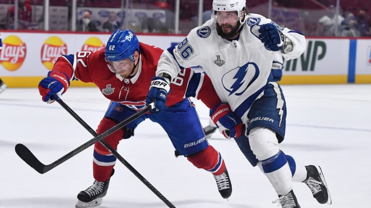 Jul 5, 2021; Montreal, Quebec, CAN; Montreal Canadiens left wing Artturi Lehkonen (62) skates against Tampa Bay Lightning right wing Nikita Kucherov (86) during the third period in game four of the 2021 Stanley Cup Final at the Bell Centre. Mandatory Credit: Eric Bolte-USA TODAY Sports