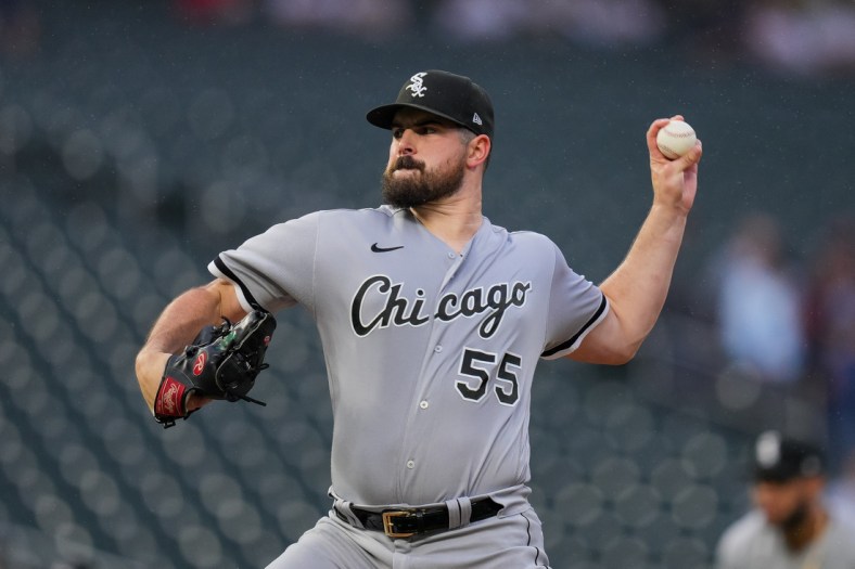 Jul 6, 2021; Minneapolis, Minnesota, USA; Chicago White Sox starting pitcher Carlos Rodon (55) pitches against the Minnesota Twins in the first inning at Target Field. Mandatory Credit: Brad Rempel-USA TODAY Sports