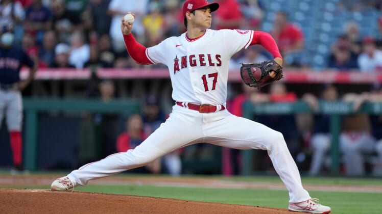 Jul 6, 2021; Anaheim, California, USA; Los Angeles Angels starting pitcher Shohei Ohtani (17) delivers a pitch in the first inning at bat  at Angel Stadium. Mandatory Credit: Kirby Lee-USA TODAY Sports