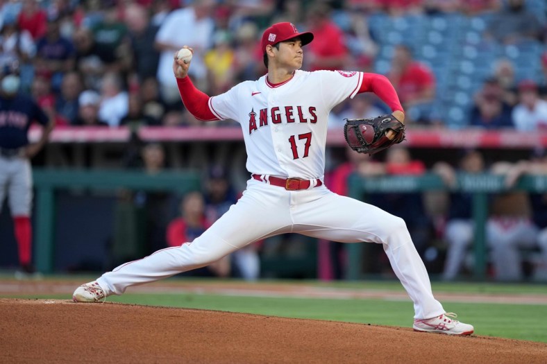 Jul 6, 2021; Anaheim, California, USA; Los Angeles Angels starting pitcher Shohei Ohtani (17) delivers a pitch in the first inning at bat  at Angel Stadium. Mandatory Credit: Kirby Lee-USA TODAY Sports