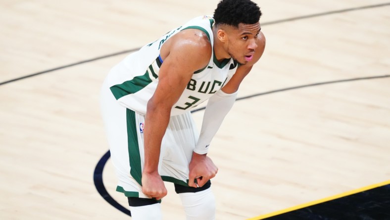 Jul 6, 2021; Phoenix, Arizona, USA; Milwaukee Bucks forward Giannis Antetokounmpo (34) reacts against the Phoenix Suns during the second half in game one of the 2021NBA Finals at Phoenix Suns Arena. Mandatory Credit: Mark J. Rebilas-USA TODAY Sports