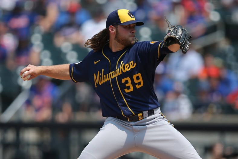 Jul 7, 2021; New York City, New York, USA; Milwaukee Brewers starting pitcher Corbin Burnes (39) throws a pitch against the New York Mets during the first inning at Citi Field. Mandatory Credit: Brad Penner-USA TODAY Sports