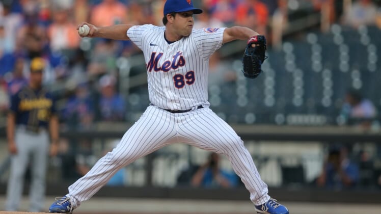 Jul 7, 2021; New York City, New York, USA; New York Mets starting pitcher Robert Stock (89) pitches against the Milwaukee Brewers during the first inning at Citi Field. Mandatory Credit: Brad Penner-USA TODAY Sports