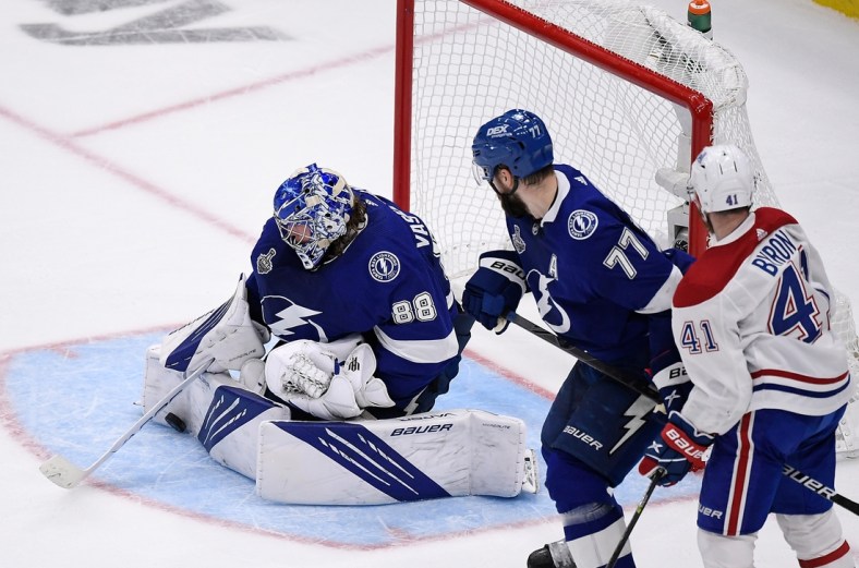 Jul 7, 2021; Tampa, Florida, USA; Tampa Bay Lightning goaltender Andrei Vasilevskiy (88) makes a save against the Montreal Canadiens during the second period in game five of the 2021 Stanley Cup Final at Amalie Arena. Mandatory Credit: Douglas DeFelice-USA TODAY Sports
