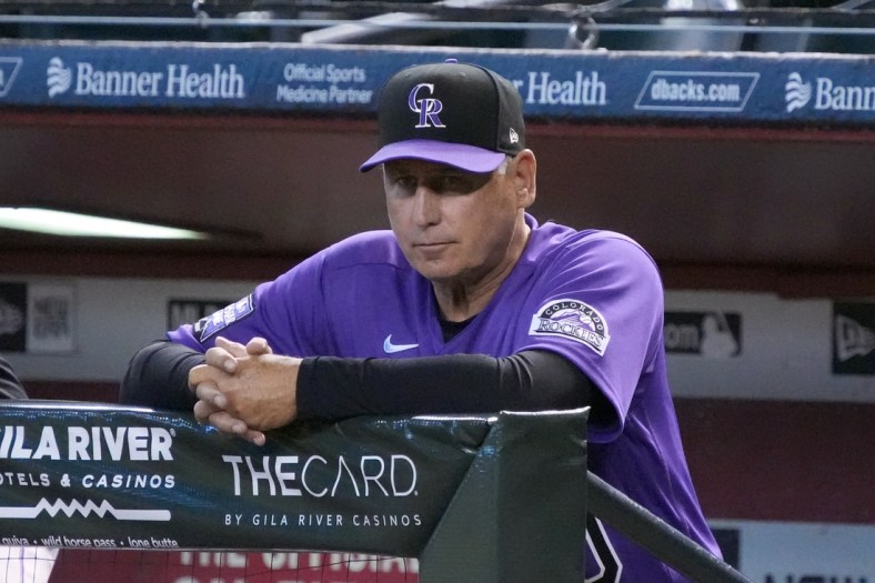 Jul 8, 2021; Phoenix, Arizona, USA; Colorado Rockies manager Bud Black (10) watches game action from the dugout against the Arizona Diamondbacks in the first inning at Chase Field. Mandatory Credit: Rick Scuteri-USA TODAY Sports