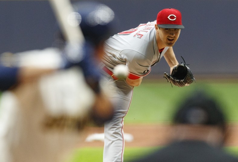 Jul 8, 2021; Milwaukee, Wisconsin, USA;  Cincinnati Reds pitcher Tyler Mahle (30) throws a pitch during the first inning against the Milwaukee Brewers at American Family Field. Mandatory Credit: Jeff Hanisch-USA TODAY Sports