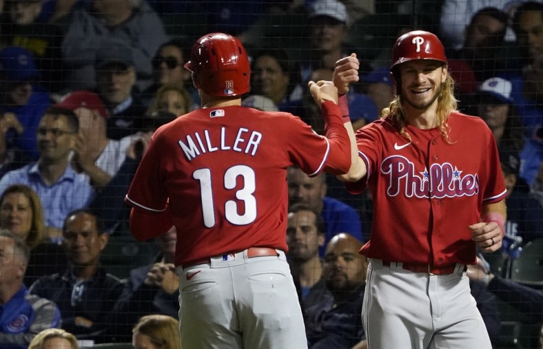 Jul 8, 2021; Chicago, Illinois, USA; Philadelphia Phillies first baseman Brad Miller (13) is greeted by center fielder Travis Jankowski (9) after hitting a two run home run against the Chicago Cubs during the fifth inning at Wrigley Field. Mandatory Credit: David Banks-USA TODAY Sports