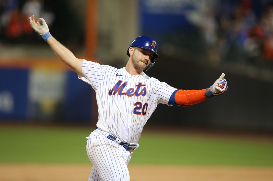 Jul 9, 2021; New York City, New York, USA; New York Mets first baseman Pete Alonso (20) reacts as he rounds the bases after hitting a three-run home run against the Pittsburgh Pirates during the sixth inning at Citi Field. Mandatory Credit: Brad Penner-USA TODAY Sports