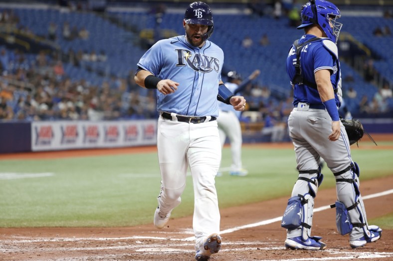 Jul 9, 2021; St. Petersburg, Florida, USA; Tampa Bay Rays catcher Mike Zunino (10) reacts after scoring a run during the third inning against the Toronto Blue Jays at Tropicana Field. Mandatory Credit: Kim Klement-USA TODAY Sports