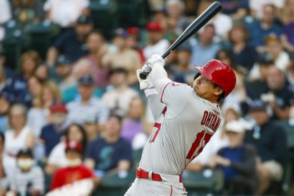 Jul 9, 2021; Seattle, Washington, USA; Los Angeles Angels designated hitter Shohei Ohtani (17) hits a solo home run against the Seattle Mariners during the third inning at T-Mobile Park. Mandatory Credit: Joe Nicholson-USA TODAY Sports