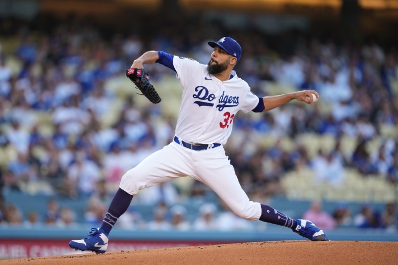 Jul 9, 2021; Los Angeles, California, USA; Los Angeles Dodgers starting pitcher David Price (33) delivers a pitch in the first inning against the Arizona Diamondbacks  at Dodger Stadium. Mandatory Credit: Kirby Lee-USA TODAY Sports