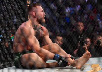 Dustin Poirier wins by TKO after Conor McGregor injures ankle