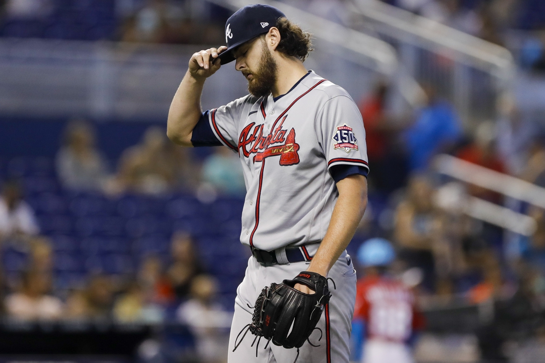 Jul 11, 2021; Miami, Florida, USA; Atlanta Braves starting pitcher Ian Anderson (36) reacts after the first inning against the Miami Marlins at loanDepot Park. Mandatory Credit: Sam Navarro-USA TODAY Sports