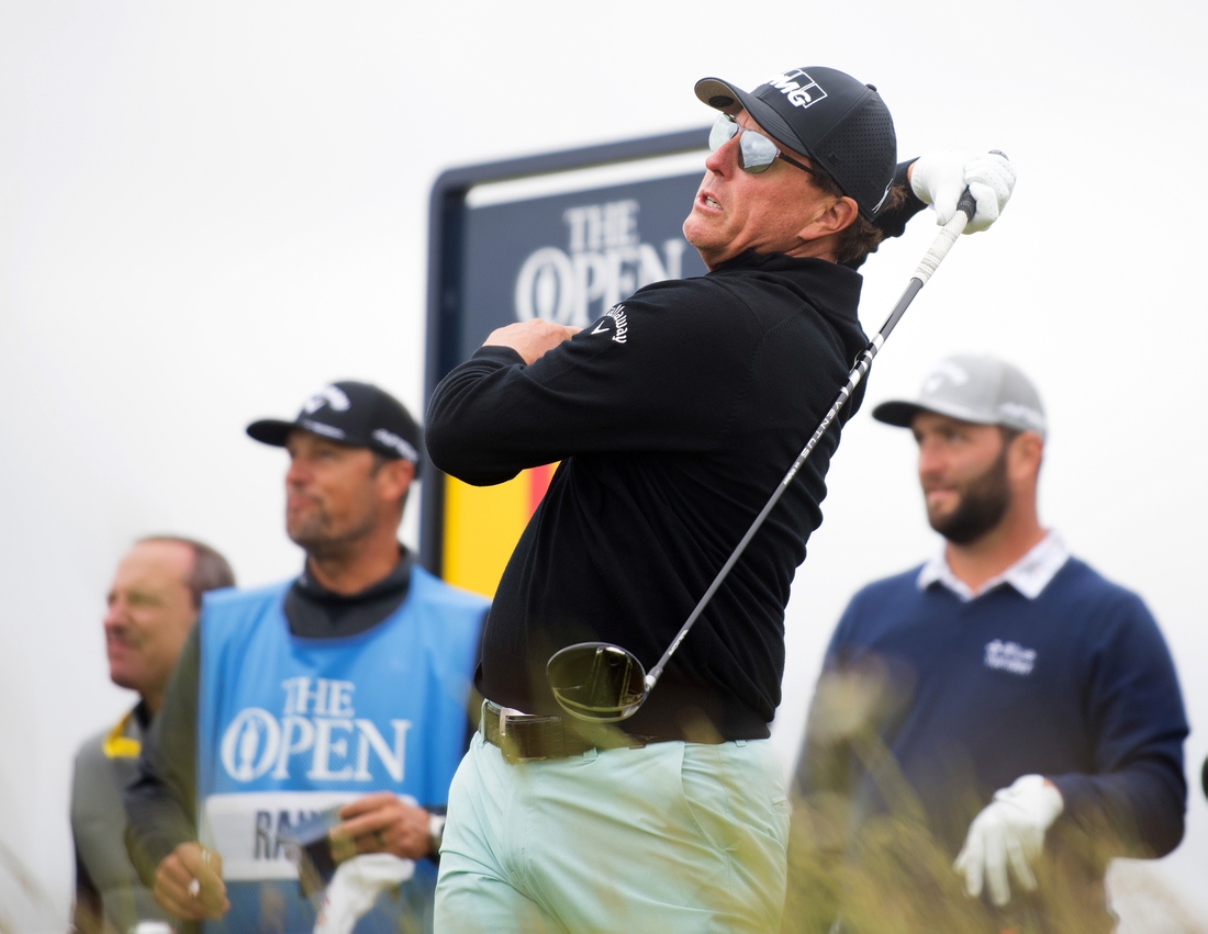 Jul 14, 2021; Sandwich, England, GBR; Phil Mickelson plays his shot from the tenth tee during a practice round for the Open Championship golf tournament at Royal St. George's Golf Course. Mandatory Credit: Sandra Mailer-USA TODAY Sports