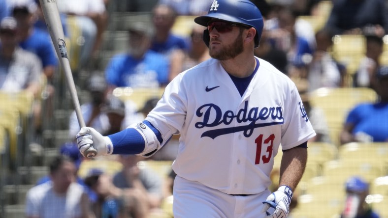 Jul 11, 2021; Los Angeles, California, USA; Los Angeles Dodgers first baseman Max Muncy (13) at the plate during the Dodgers win over the Arizona Diamondbacks at Dodger Stadium. Mandatory Credit: Robert Hanashiro-USA TODAY Sports