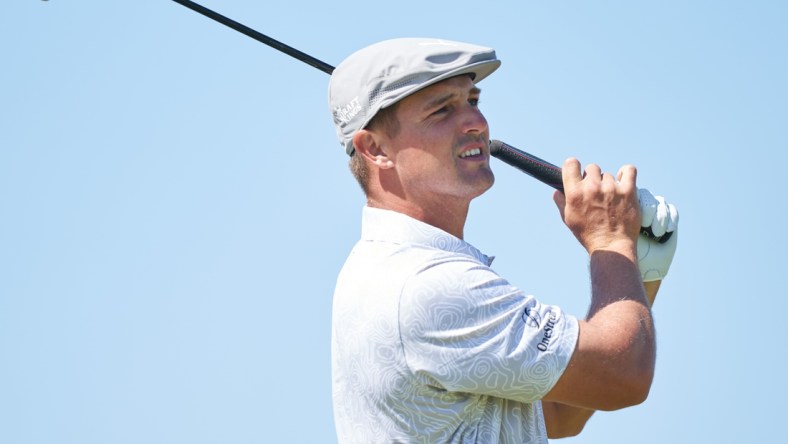 Jul 16, 2021; Sandwich, England, GB; Bryson DeChambeau plays his shot from the third tee during the second round of the Open Championship golf tournament. Mandatory Credit: Peter van den Berg-USA TODAY Sports