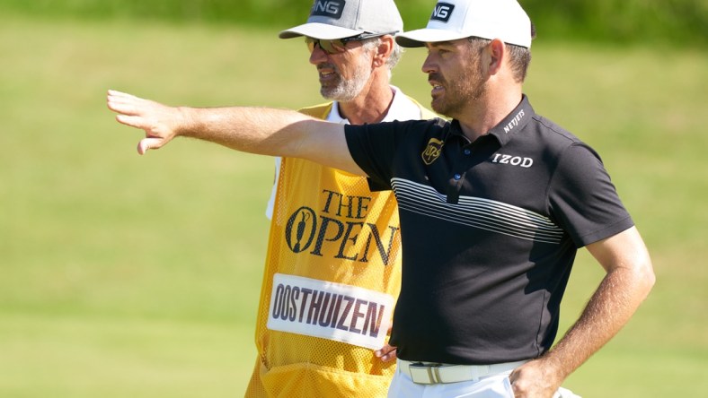 Jul 16, 2021; Sandwich, England, GB; Louis Oosthuizen  looks over his putt on the sixth green during the second  round of the Open Championship golf tournament. Mandatory Credit: Peter van den Berg-USA TODAY Sports