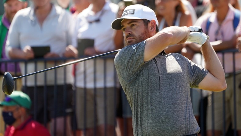 Jul 18, 2021; Sandwich, England, GBR; Louis Oosthuizen  plays his shot from the second tee during the final round of the Open Championship golf tournament. Mandatory Credit: Peter van den Berg-USA TODAY Sports