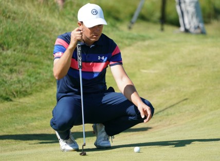 Jul 18, 2021; Sandwich, England, GBR; Jordan Spieth lines up a putt on the eighth green during the final round of the Open Championship golf tournament. Mandatory Credit: Peter van den Berg-USA TODAY Sports