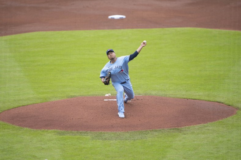 Jul 18, 2021; Buffalo, New York, CAN; Toronto Blue Jays pitcher Hyun Jin Ryu (99) delivers a pitch during the first inning against the Texas Rangers at Sahlen Field. Mandatory Credit: Gregory Fisher-USA TODAY Sports
