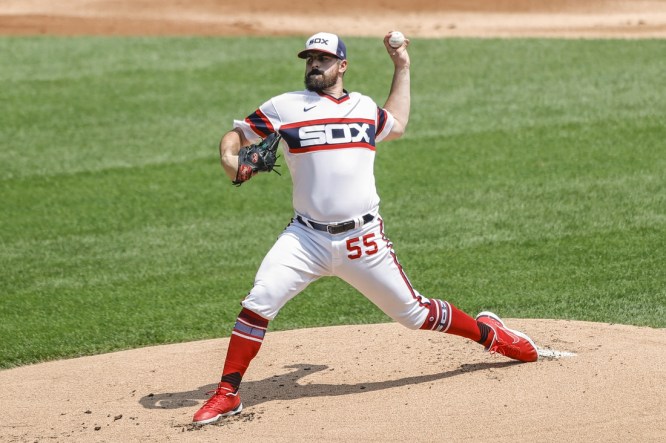 Jul 18, 2021; Chicago, Illinois, USA; Chicago White Sox starting pitcher Carlos Rodon (55) throws a pitch against the Houston Astros during the first inning at Guaranteed Rate Field. Mandatory Credit: Kamil Krzaczynski-USA TODAY Sports