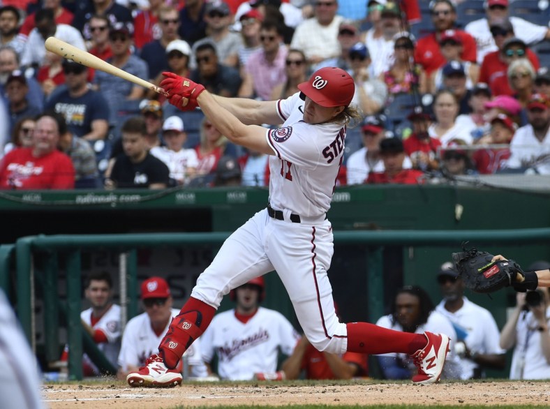 Jul 18, 2021; Washington, District of Columbia, USA; Washington Nationals outfielder Andrew Stevenson hits an RBI double against the San Diego Padres during the third inning at Nationals Park. Mandatory Credit: Brad Mills-USA TODAY Sports