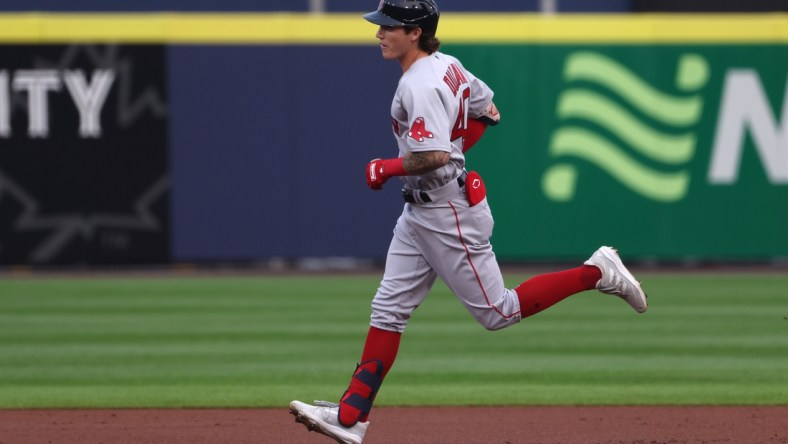 Jul 19, 2021; Buffalo, New York, USA;  Boston Red Sox center fielder Jarren Duran (40) hits a two run home run during the first inning at bat at Sahlen Field. Mandatory Credit: Timothy T. Ludwig-USA TODAY Sports