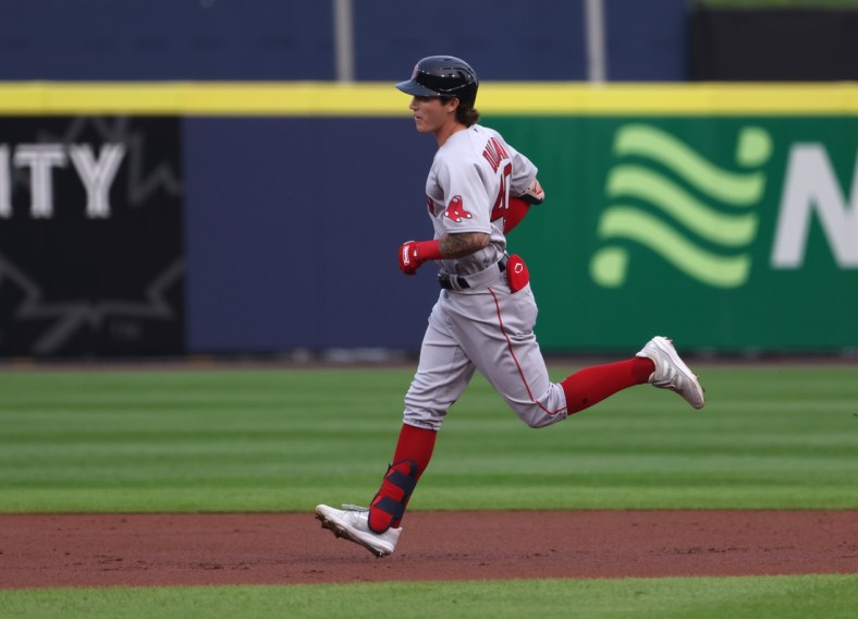 Jul 19, 2021; Buffalo, New York, USA;  Boston Red Sox center fielder Jarren Duran (40) hits a two run home run during the first inning at bat at Sahlen Field. Mandatory Credit: Timothy T. Ludwig-USA TODAY Sports