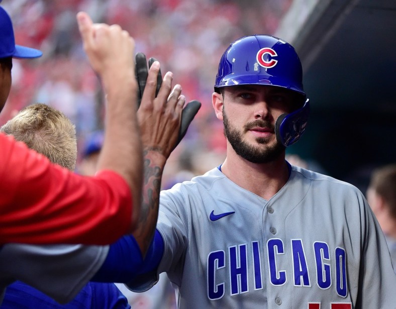 Jul 20, 2021; St. Louis, Missouri, USA;  Chicago Cubs left fielder Kris Bryant (17) is congratulated by teammates after scoring during the second inning against the St. Louis Cardinals at Busch Stadium. Mandatory Credit: Jeff Curry-USA TODAY Sports
