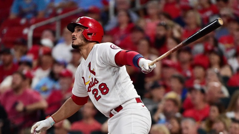 Jul 20, 2021; St. Louis, Missouri, USA;  St. Louis Cardinals third baseman Nolan Arenado (28) hits a solo home run off of Chicago Cubs starting pitcher Trevor Williams (not pictured) during the fourth inning at Busch Stadium. Mandatory Credit: Jeff Curry-USA TODAY Sports