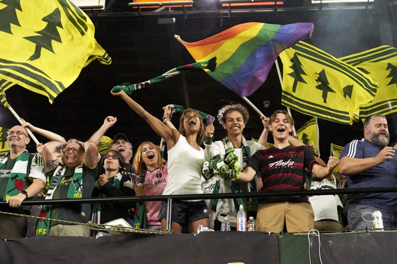 Jul 21, 2021; Portland, Oregon, USA; Portland Timbers fans celebrate after a game winning goal during the second half against Los Angeles FC at Providence Park. The Portland Timbers won 2-1. Mandatory Credit: Troy Wayrynen-USA TODAY Sports