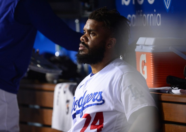 Jul 22, 2021; Los Angeles, California, USA; Los Angeles Dodgers relief pitcher Kenley Jansen (74) is relieved after giving up four runs against the San Francisco Giants during the ninth inning  at Dodger Stadium. Mandatory Credit: Gary A. Vasquez-USA TODAY Sports