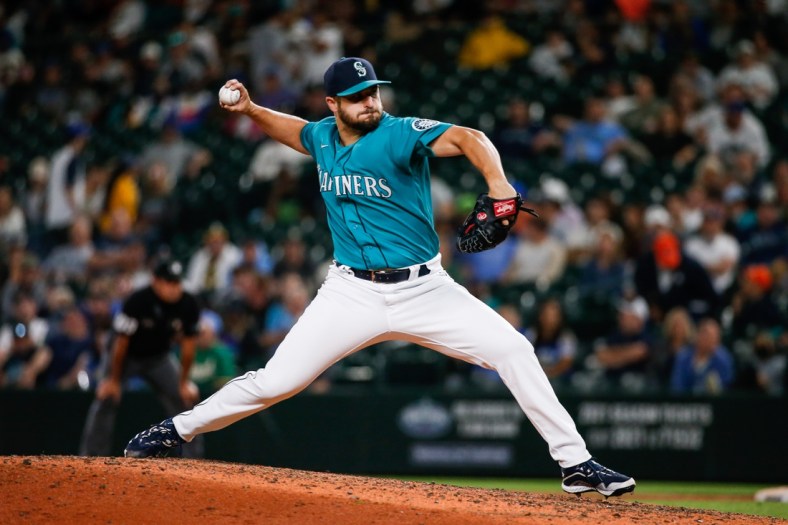 Jul 23, 2021; Seattle, Washington, USA; Seattle Mariners relief pitcher Kendall Graveman (49) throws against the Oakland Athletics during the ninth inning at T-Mobile Park. Mandatory Credit: Jennifer Buchanan-USA TODAY Sports